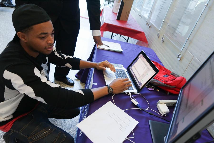 A student works on a computer.